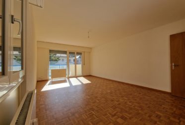 Charmant 4,5 pièces rénové avec vue, trois balcons et place de parc